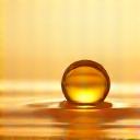 Icon representing dry or mature skin, perhaps a dewdroplet on a smooth surface, symbolizing hydration.